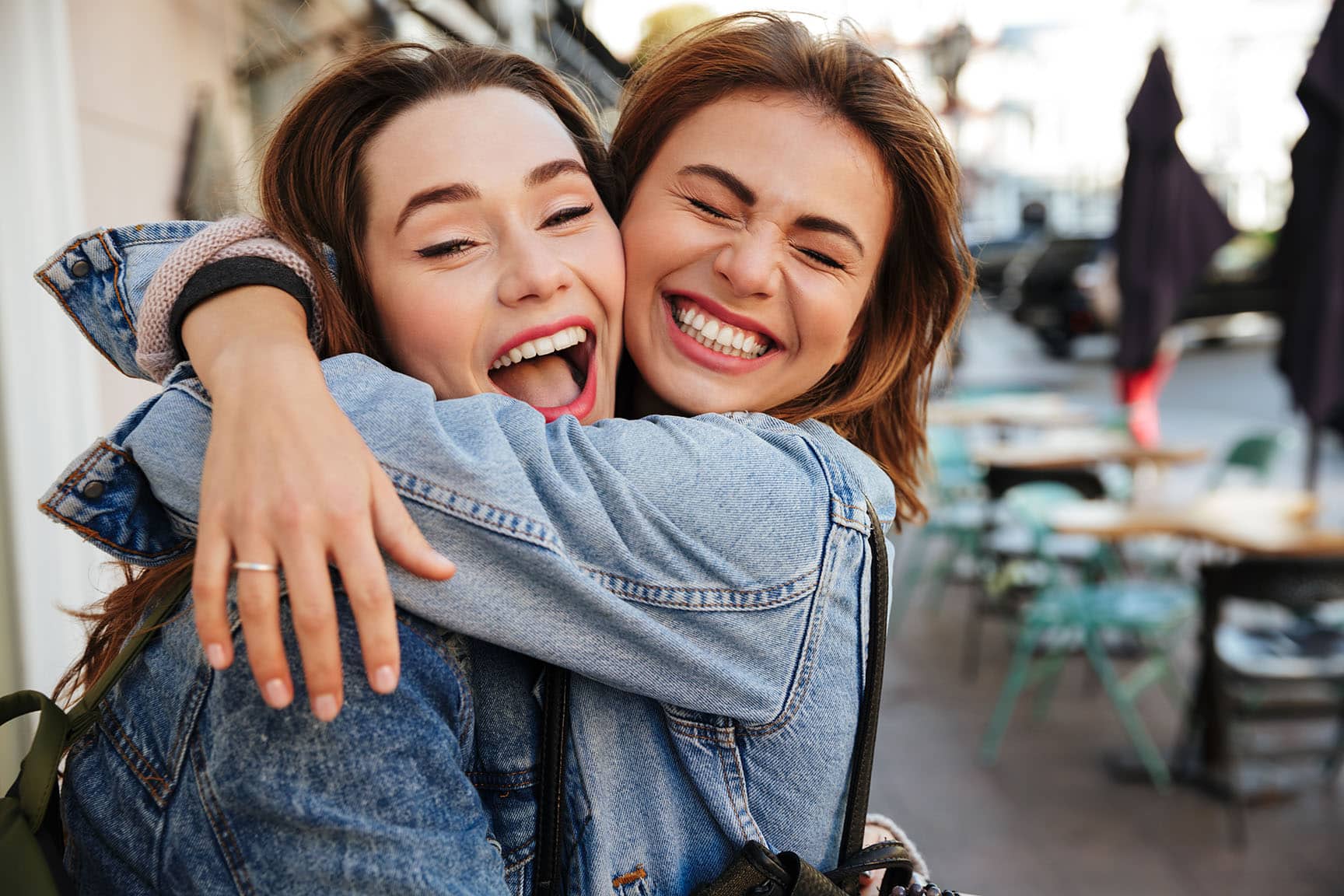 friends hugging Pristine Dental Care