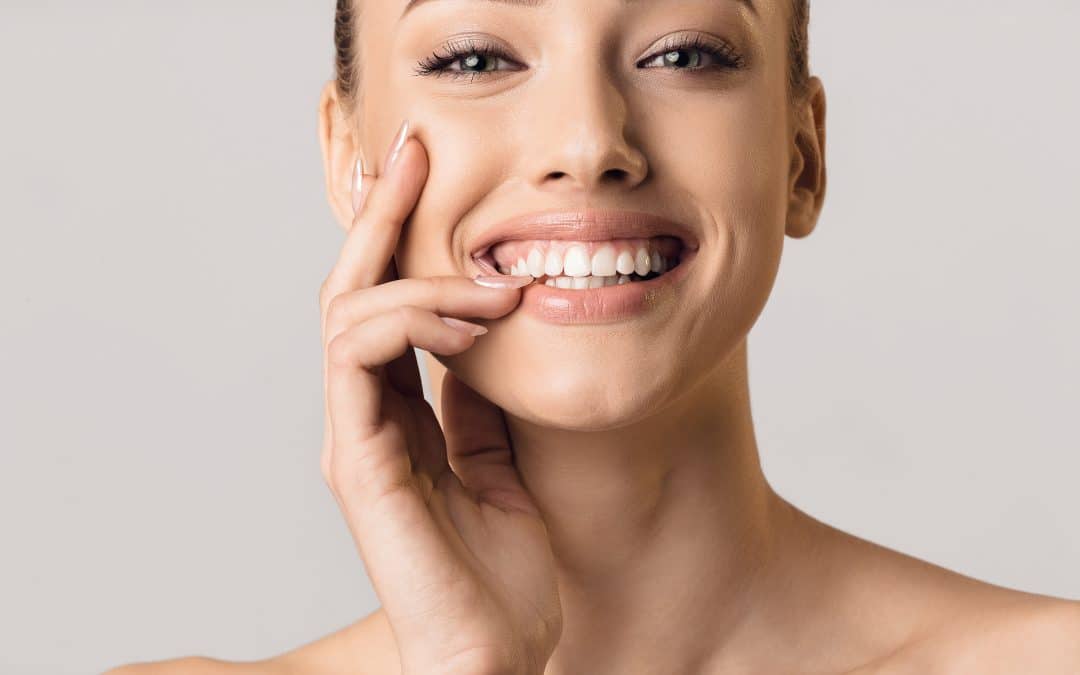 woman smiling with veneers - Pristine Dental Care